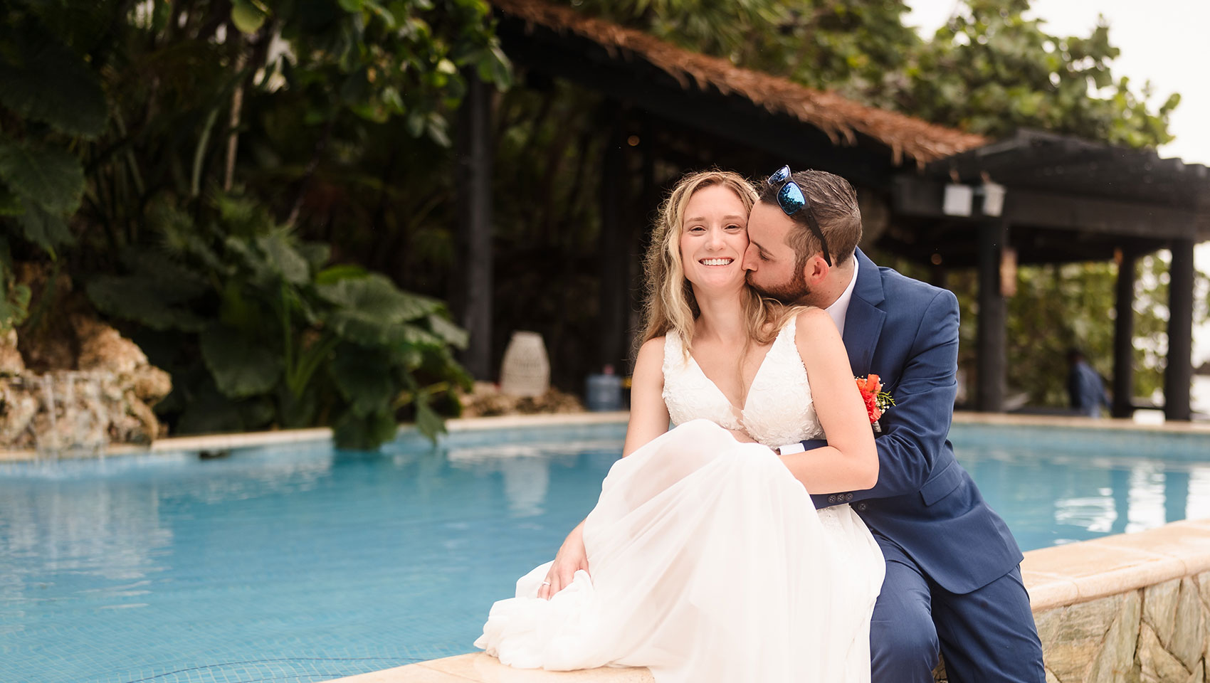 Newlyweds by the pool