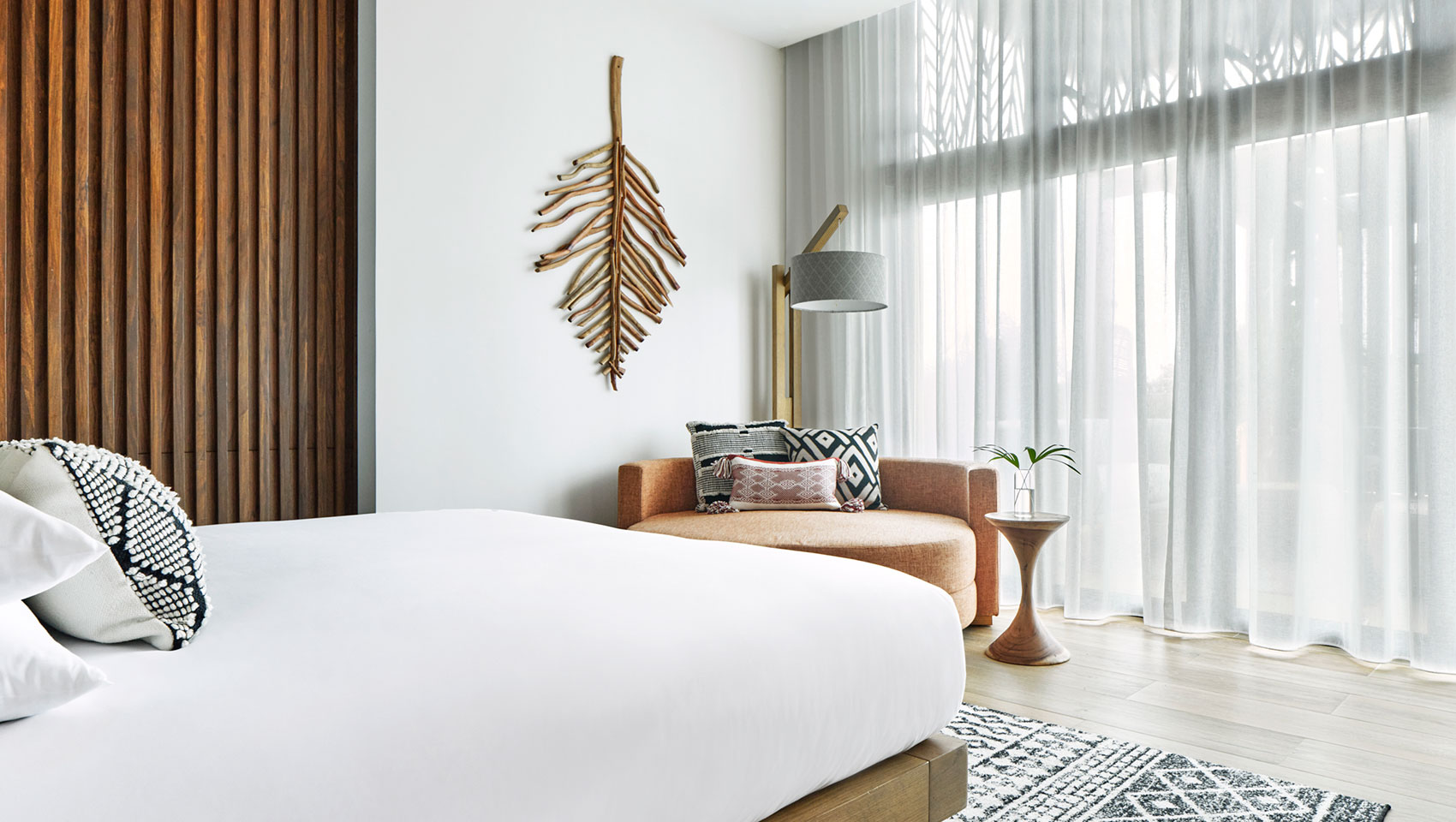 roatan spa suite bed and lounge area