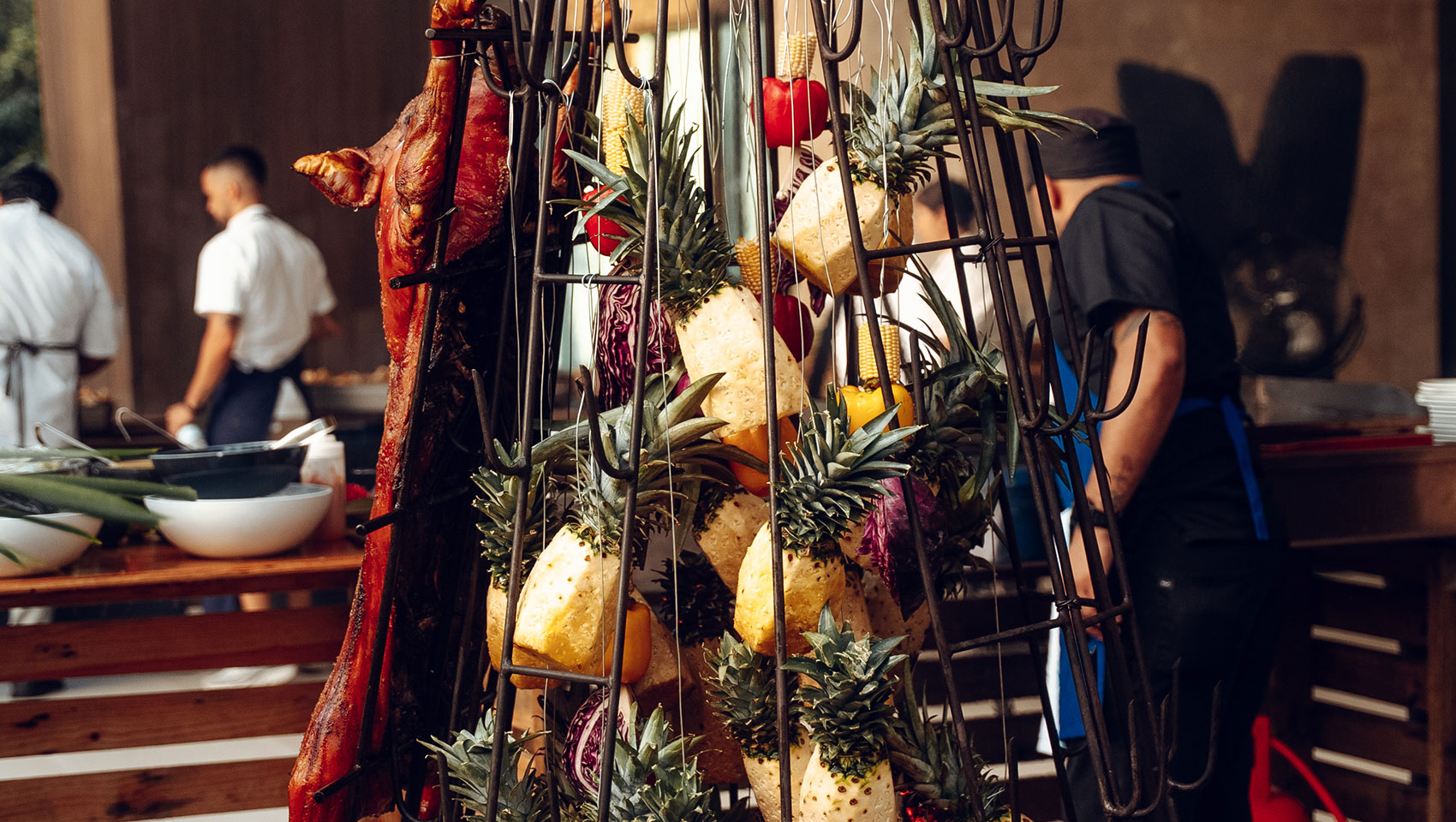 tower of pineapples and roasted pig at Guest Chef series at Kimpton Grand Roatan Resort