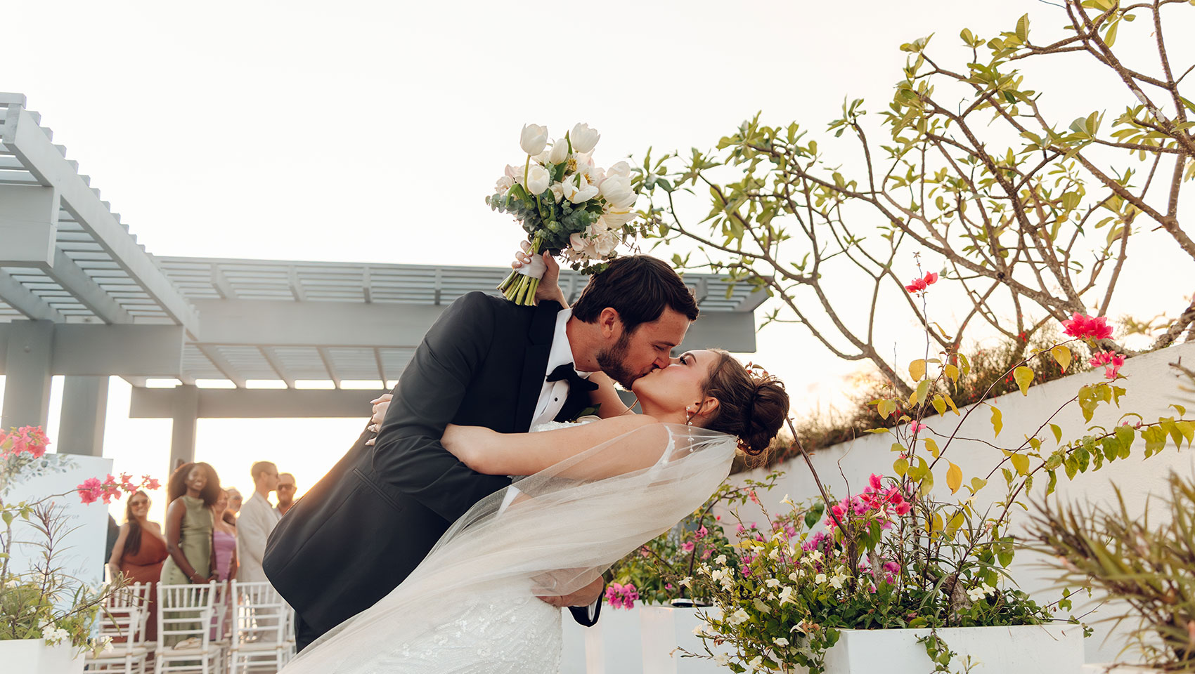 Newlyweds kiss & dip