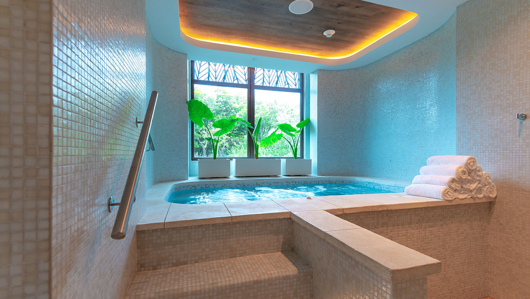 Image of Alera Bar with backlit geometric shelving