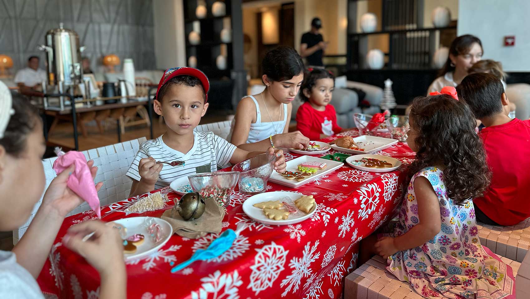 kids decorating Christmas cookies