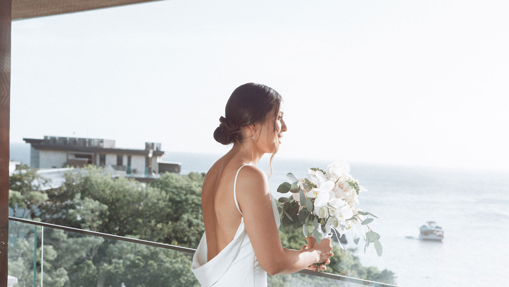 bride looking out at the ocean
