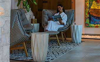 woman relaxes in robe at kao kamasa spa