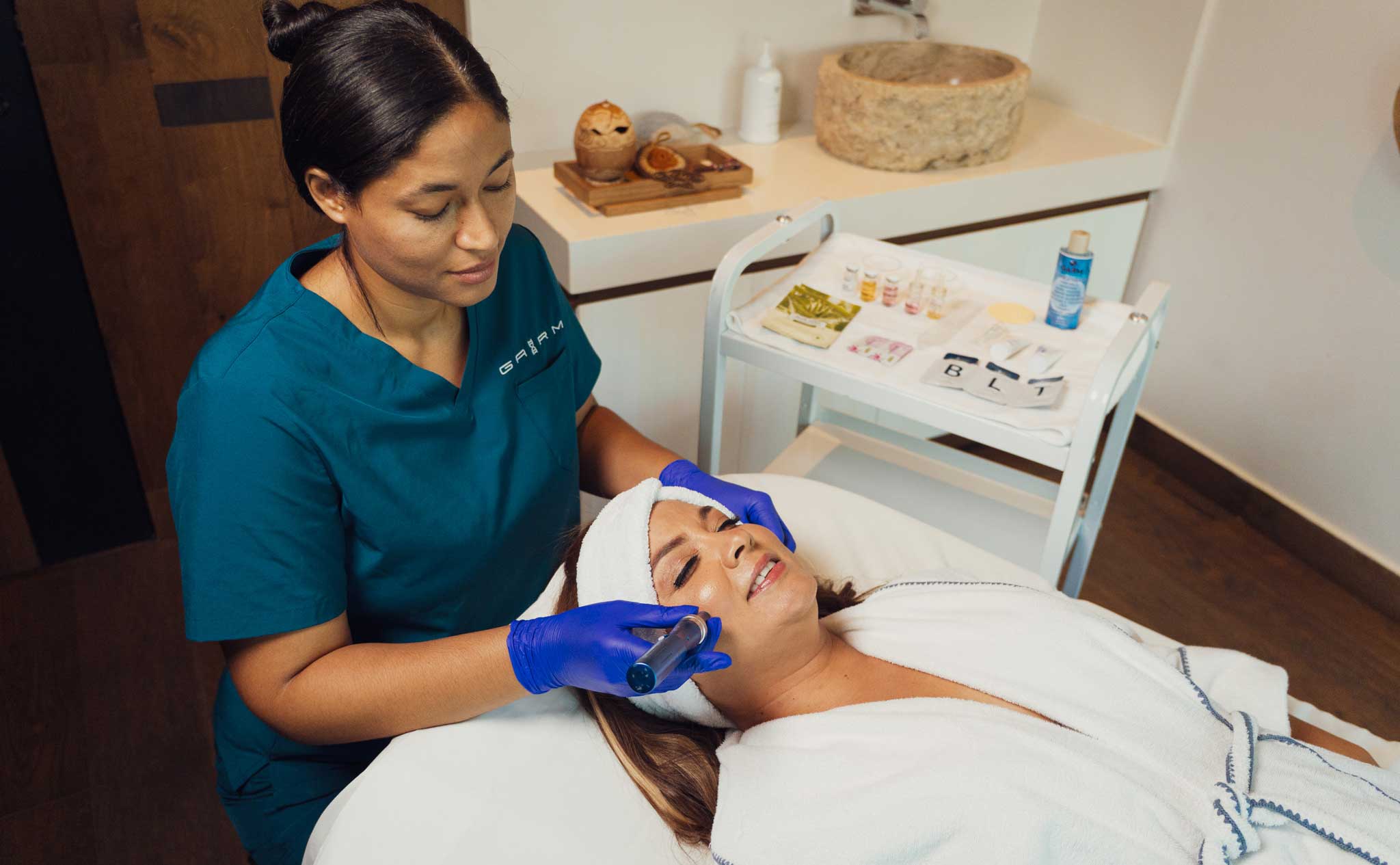 Woman receiving facial treatment at Kao Kamasa Spa