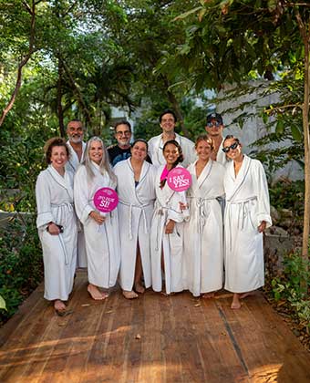Grand Roatan guests in robes