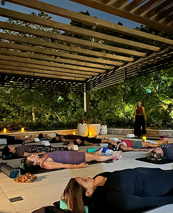 full moon yoga class at kimpton grand roatan