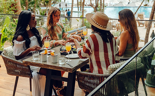 Women enjoying brunch at Alera on the outdoor terrace
