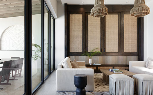 Four Bedroom Beachfront Penthouse living room seating with view of balcony