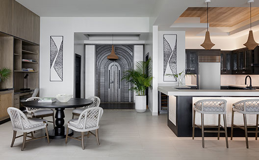 Four Bedroom Beachfront Penthouse kitchen and round dining table