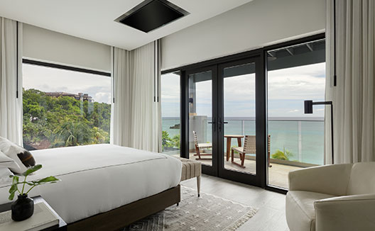 Four Bedroom Beachfront Penthouse bedroom with ocean views