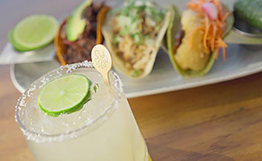 cocktail and tacos at Sea Cat